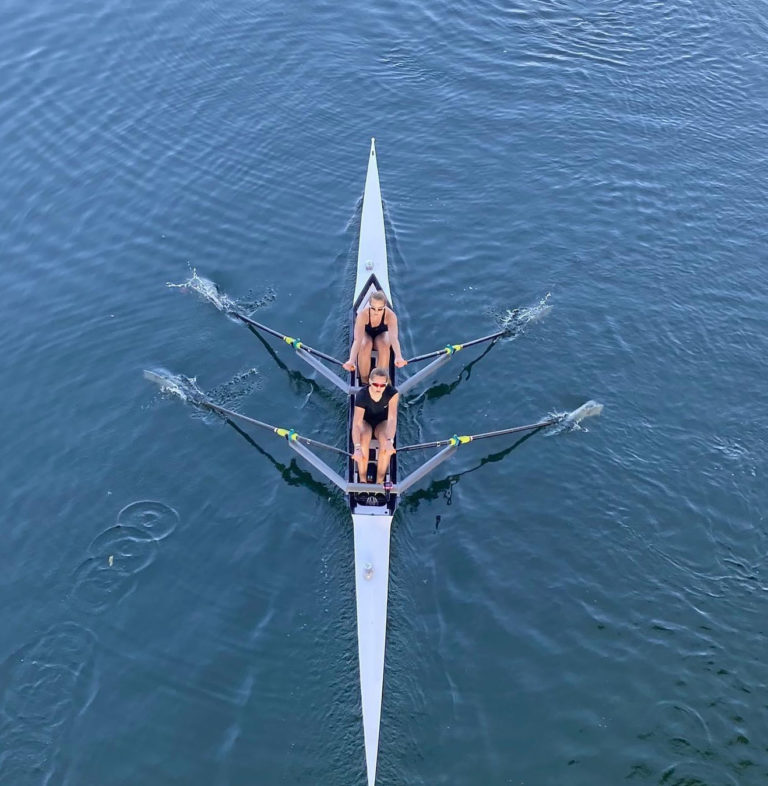 Anna rowing in the bow seat at the University of Texas.